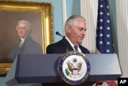 FILE - Secretary of State Rex Tillerson leaves after speaking at the State Department in Washington, Aug. 15, 2017.
