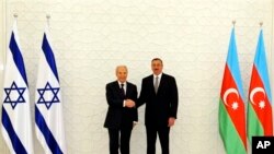 Azərbaycan prezidenti İlham Əliyev Bakıda İsrail prezidenti Şimon Pereslə görüşür. 28 iyun, 2009.