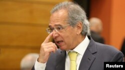 Economist Paulo Guedes is seen before a lunch between businessmen and Jair Bolsonaro, a candidate for the Presidency of the Republic for the PSL, at the Federation of Industries of Rio de Janeiro (FIRJAN) headquarters in Rio de Janeiro, Aug. 6, 2018.