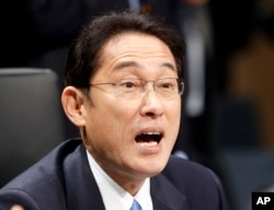 Japan's Foreign Minister Fumio Kishida speaks during the second day of the G-20 Foreign Ministers meeting in Bonn, Germany, Feb. 17, 2017.