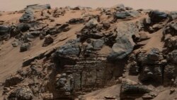 Description: An evenly-layered rock on the planet Mars, photographed by the Mast Camera (Mastcam) on NASA's Curiosity Mars Rover is shown in the NASA handout provided December 9, 2014. (REUTERS)