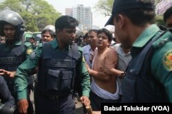 An opposition BNP activist is being arrested by policemen in Dhaka. In 2018, thousands of opposition leaders and activists were arrested in Bangladesh on allegedly trumped up cases of political violence.