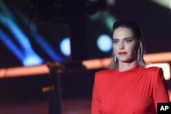 FILE - Rotem Sela, one of Israel's top models and TV hosts, during a tv reality show filming near Jerusalem, Feb. 12, 2019.