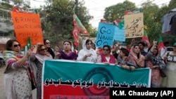 Supporters of Pakistan Tehreek-e-Insaf rally against Pakistan's Prime Minister Nawaz Sharif in Lahore. Sharif has denied claims from the "Panama Papers" of taking out any money from the country to purchase property in London or creating a business in Saud