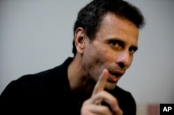 Venezuela's opposition leader Henrique Capriles speaks during an interview at his office in Caracas, Venezuela, July 30, 2018.