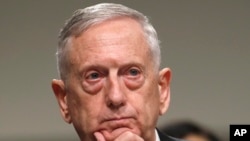 Defense Secretary Jim Mattis listens while testifying on Capitol Hill in Washington.