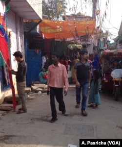 Most people in this slum in East Delhi continue with the practice of open defecation because of long waiting lines at the community toilet.