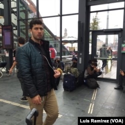 Hundreds of migrants continue to arrive in Sweden, most of them at the port city of Malmo, Sept. 22, 2015.