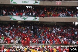 Tens of thousands of supporters of President Uhuru Kenyatta thronged to Kasarani Stadium in Nairobi to witness the launch of Jubilee Party, Sept. 10, 2016. (M. Yusuf/VOA)