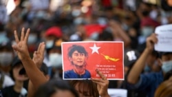 People rally in a protest against the military coup and to demand the release of elected leader Aung San Suu Kyi, in Yangon, Myanmar, February 8, 2021. (REUTERS/Stringer)