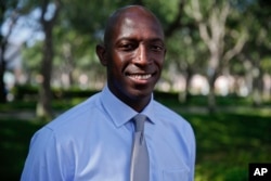 FILE - Miramar Mayor Wayne Messam poses for a portrait, in Miramar, Florida, March 27, 2019.