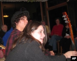 Newcomers like Eileen and Mitchell are always welcome to join in the music-making in Petric's living room