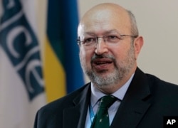 FILE - OSCE Secretary General Lamberto Zannier says the Ukraine cease-fire "has being holding for more than 10 days," which is yielding the opportunity "to make progress at a political level."