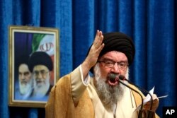Iranian senior cleric Ahmad Khatami delivers his sermon during Friday prayer ceremony in Tehran, Iran, Jan. 5, 2018. The hard-line Iranian cleric has called on Iran to create its own indigenous social media apps, blaming them for the unrest that followed days of protest in the Islamic Republic over its economy.
