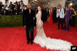 Kanye West and Kim Kardashian West attend The Metropolitan Museum of Art's Costume Institute benefit gala celebrating "China: Through the Looking Glass" on May 4, 2015, in New York.
