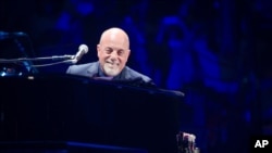 FILE - Billy Joel performs at Madison Square Garden in New York, May 9, 2014.