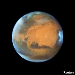 The planet Mars is shown May 12, 2016 in this NASA Hubble Space Telescope view when it was 50 million miles from Earth.
