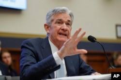 FILE - Federal Reserve Board Chair Jerome Powell speaks to members of the House Committee on Financial Services on Capitol Hill in Washington, Feb. 27, 2019.
