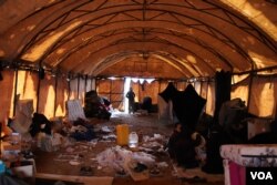 Al-Hol camp does not have enough small tents to house new arrivals, so many crowd into larger spaces that are generally dirty, cold and unsafe for children on March 4, 2019 in al-Hol Camp, Syria.