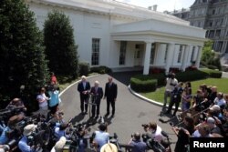 FILE - Republican leaders, left to right, Senate Majority Whip John Cornyn, Majority Leader Mitch McConnell and John Thune speak with the media after a lunch meeting with U.S. President Donald Trump to discuss health care at the White House