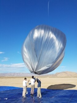 One of the balloons is being prepared for flight soon after the 2019 Ridgecrest earthquake activity. The balloons were launched from California’s Mojave Desert and allowed to pass over the area. (Photo Credit: NASA/JPL-Caltech)