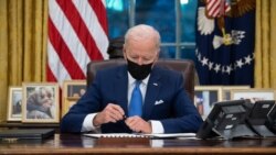 US President Joe Biden signs executive orders related to immigration
