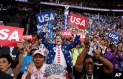 Delegates react during the final day of the Democratic National Convention in Philadelphia, July 28, 2016.
