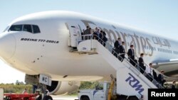 Japan's national soccer players arrive ahead of the Confederations Cup which starts on June 15, at Brasilia Air Base, Brazil, June 12, 2013.