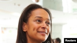 FILE - Isabel dos Santos, the daughter of Angolan President Jose Eduardo dos Santos and head of state energy giant Sonangol, speaks during an interview in Luanda, Angola, June 9, 2016.