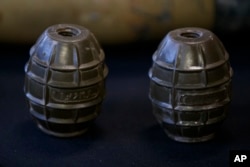 Hand grenades are on display at the Iranian Materiel Display (IMD) at Joint Base Anacostia-Bolling, in Washington, Nov. 29, 2018. The Trump administration accused Iran of stepping up violations of a U.N. ban on arms exports by sending rockets and other weaponry to rebels in Afghanistan and Yemen.