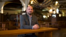 Hofbraeu manager Bjoern Schwarz poses for a photo at Berlin's biggest restaurant Hofbraeu Berlin, in Berlin, Germany, Thursday, Dec. 17, 2020. (AP Photo/Markus Schreiber)