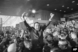FILE - Richard Nixon makes his first public appearance in Miami Beach Aug. 5, 1968. The Republican National Convention selected Nixon as the nominee for president. (AP Photo)
