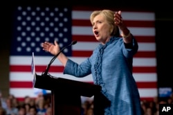 Democratic presidential hopeful Hillary Clinton speaks during an election night event at the Palm Beach County Convention Center in West Palm Beach, Fla.,March 15, 2016.