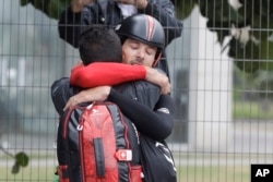 Cyclist Fabian Cancellara of Switzerland celebrates after crossing the finish line to win the men's individual time trial event at the 2016 Summer Olympics in Pontal beach, Rio de Janeiro, Brazil, Wednesday, Aug. 10, 2016.