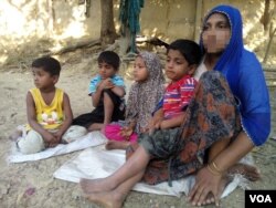 To escape violence in Rakhine state during the military crackdown there, in November 2016, Rohingya woman Haresa Begum fled to Bangladesh with her four children, leaving her husband in Myanmar. A week after this photo was taken at a Rohingya colony in Cox