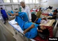 An injured man receives treatment in a hospital, after a blast in Jalalabad, Afghanistan, April 8, 2019.
