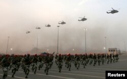 Members of Saudi security forces take part in a military parade in preparation for the annual Haj pilgrimage in the holy city of Mecca September 5, 2016