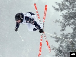 Perrine Laffont, of France, jumps in the women's moguls event at the World Cup freestyle skiing competition at Deer Valley resort Thursday, Feb. 2, 2017, in Park City, Utah. (AP Photo/Rick Bowmer)