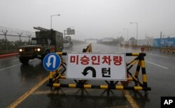 A South Korean military vehicle crosses Unification Bridge, which leads to the demilitarized zone, near the border village of Panmunjom in Paju, South Korea, May 16, 2018.
