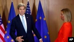 US Secretary of State John Kerry speaks meets with EU foreign ministers in Brussels.