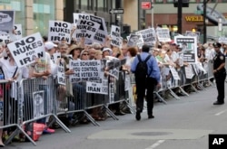 FILE - Supporters line seventh avenue during the "Stop Iran" protest near Times Square in New York, July 22, 2015.