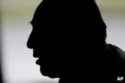 FILE - A Mexican immigrant speaks to a reporter in eastern North Carolina on September 15, 2016. The man arrived in North Carolina nearly two decades ago without a visa. "For me, this my pueblo,” he said of his adopted country. “I love this place."