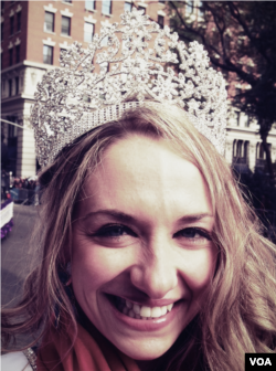 Ms. Veteran America, Allaina Guitron, a 13-year active duty Army sergeant, rode a prominent float in NYC's Veterans Day parade as part of her job to help bring public awareness to the plight of America's 35,000 homeless female veterans. Photo: A. Phillips/VOA