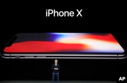 Apple CEO Tim Cook announces the new iPhone X.