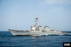 The guided-missile destroyer USS Mason is replenished at sea. The ship responded to an incoming missile threat off Yemen’s coast Oct. 12, 2016.