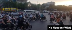 Even on a weekend, the streets of Ho Chi Minh City are filled with motorbikes, which sometimes carry a family of five at once.