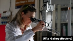 Art historian Letizia Montalbano studies 'Il Paesaggio' by Renaissance artist Leonardo da Vinc