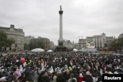 FILE - housands of Muslims gather in Trafalgar Square in London to celebrate the festival of Eid al-Fitr, Oct. 28, 2006.