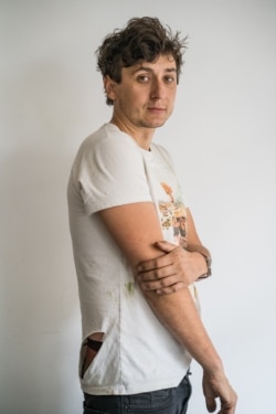 Mihai Dragolea is seen in a photo taken after he and his crew were attacked by unidentified assailants. (Courtesy: Greenpeace/Ioana Moldovan)