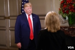 President Donald Trump answers a question from VOA contributor Greta Van Susteren on the sidelines of the G-20 Summit in Buenos Aires, Argentina, Nov. 30, 2018.